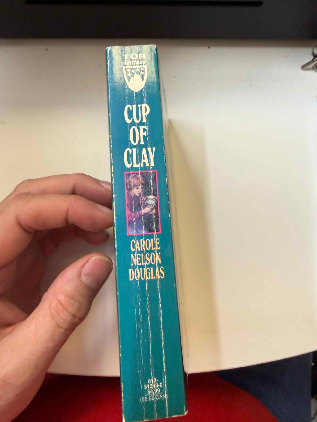 Actual copy spine showing creases