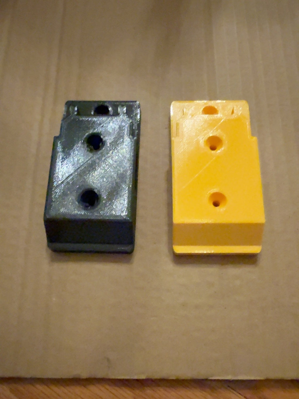 Black and yellow compact PETG tool mounts compatible with DEWALT 20V MAX-style tools, alternate view
