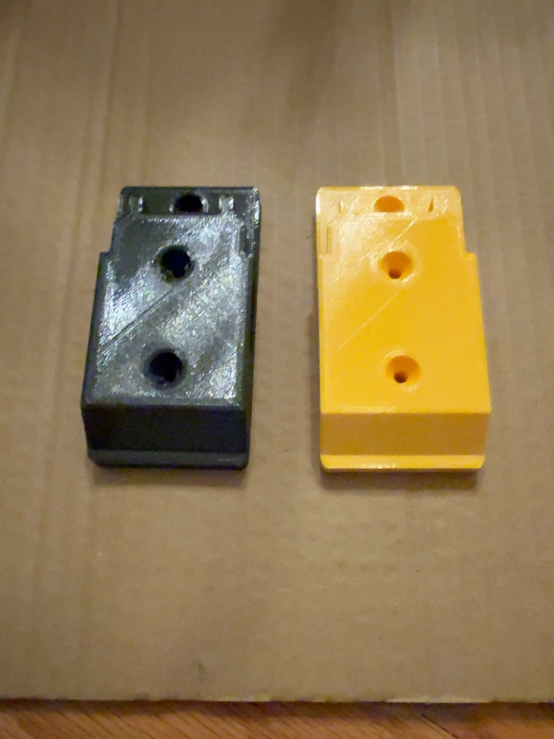 Black and yellow compact PETG tool mounts compatible with DEWALT 20V MAX-style tools, alternate view