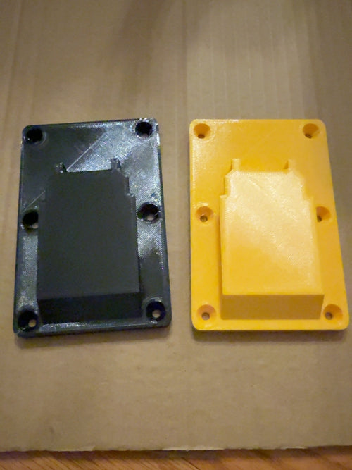 Black and yellow PETG single battery mounts compatible with DEWALT 20V MAX-style batteries, alternate view