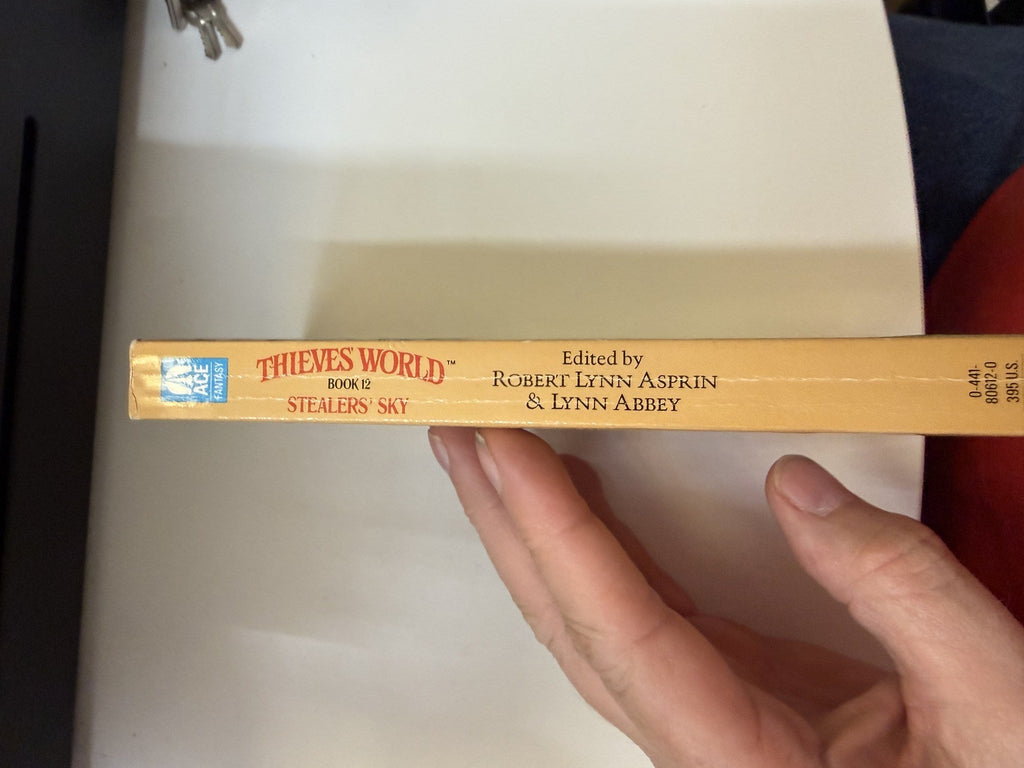 Spine of the used Stealers' Sky paperback
