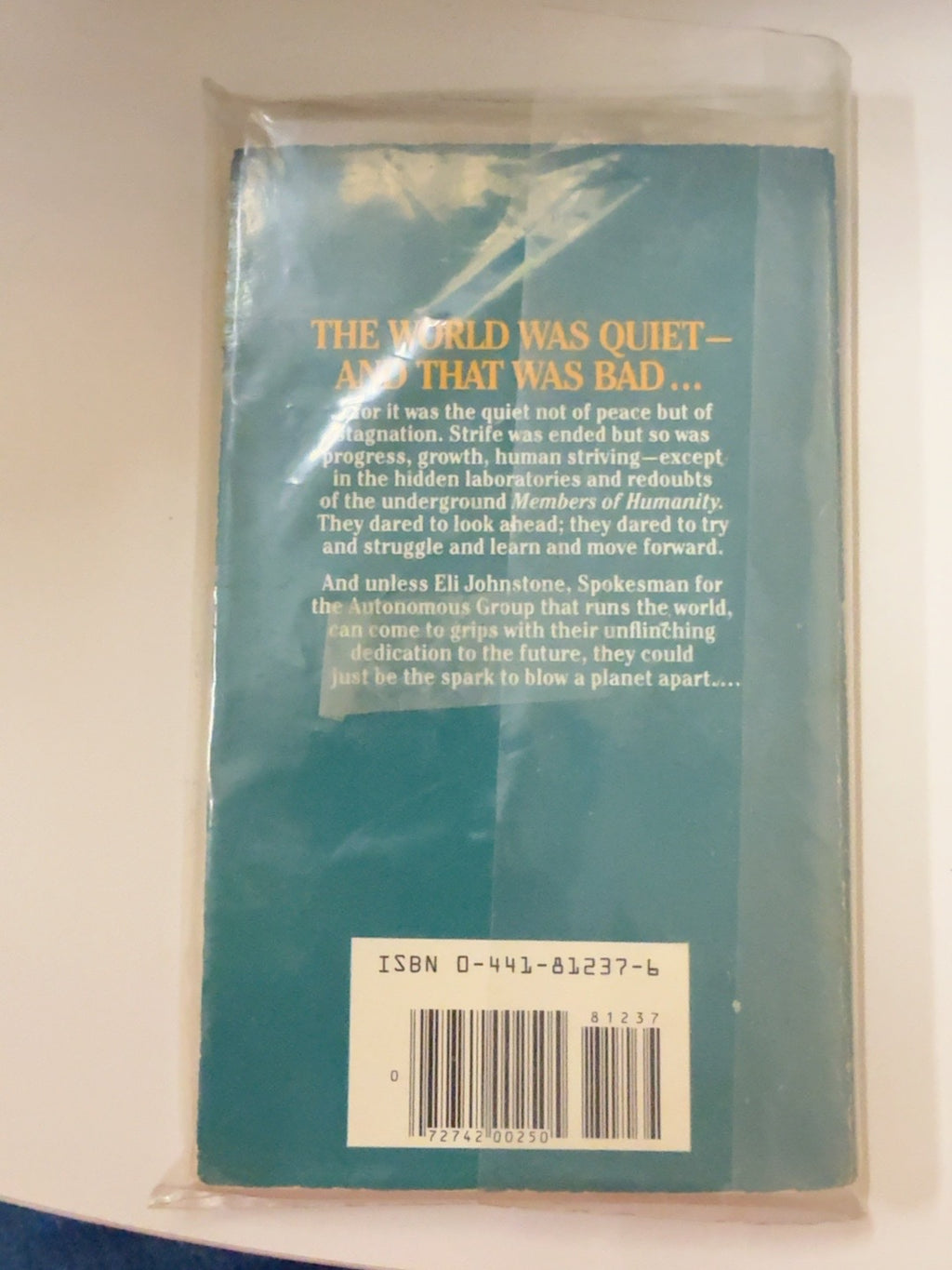 Back cover and ISBN of Time to Teleport and Delusion World by Gordon R. Dickson
