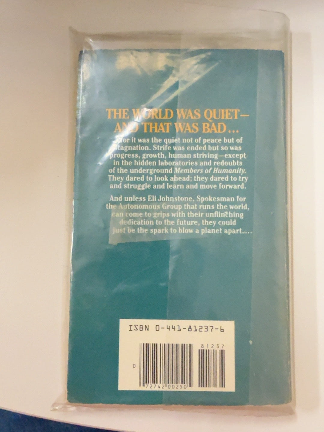 Back cover and ISBN of Time to Teleport and Delusion World by Gordon R. Dickson