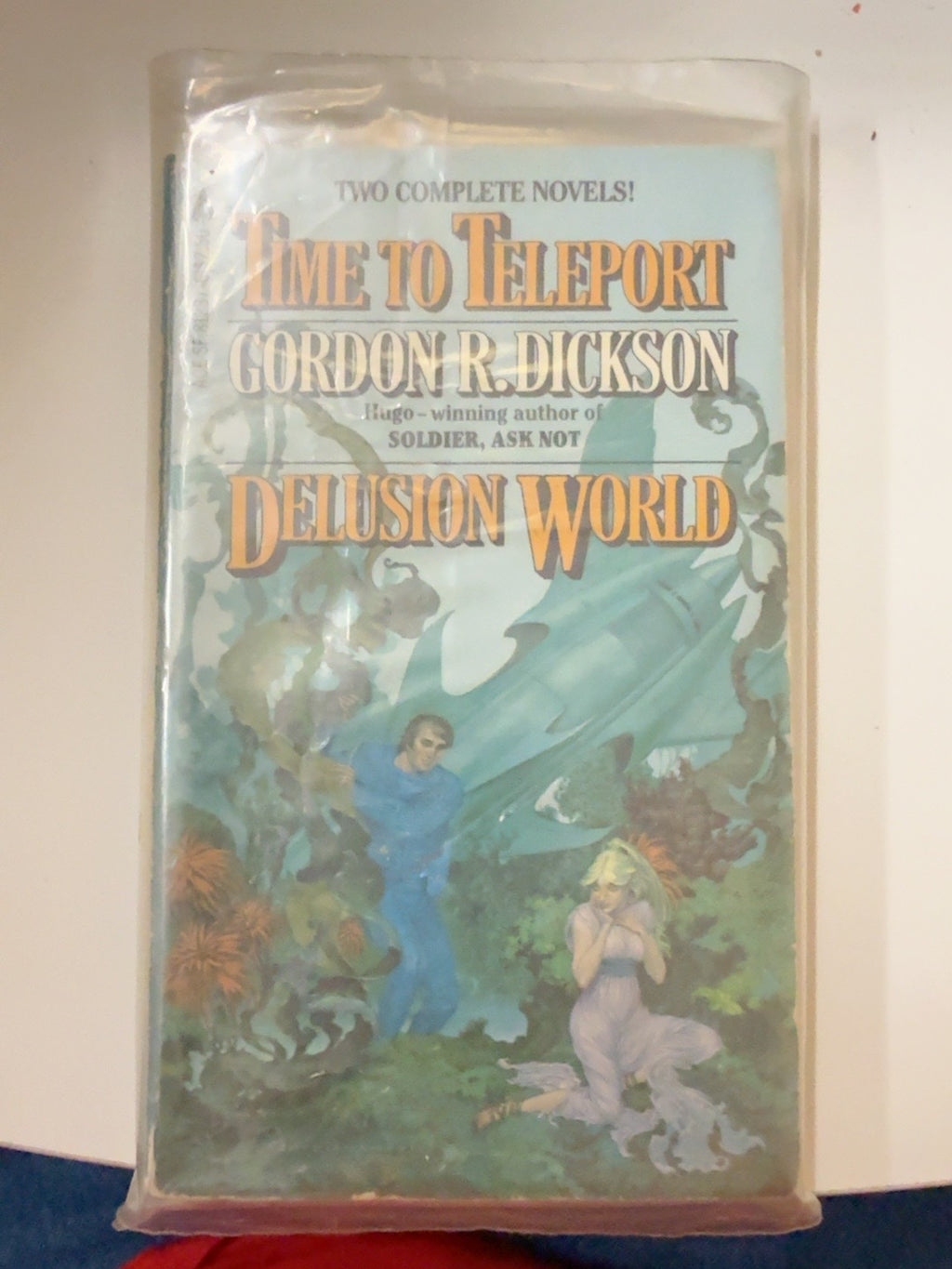 Front cover of Time to Teleport and Delusion World by Gordon R. Dickson