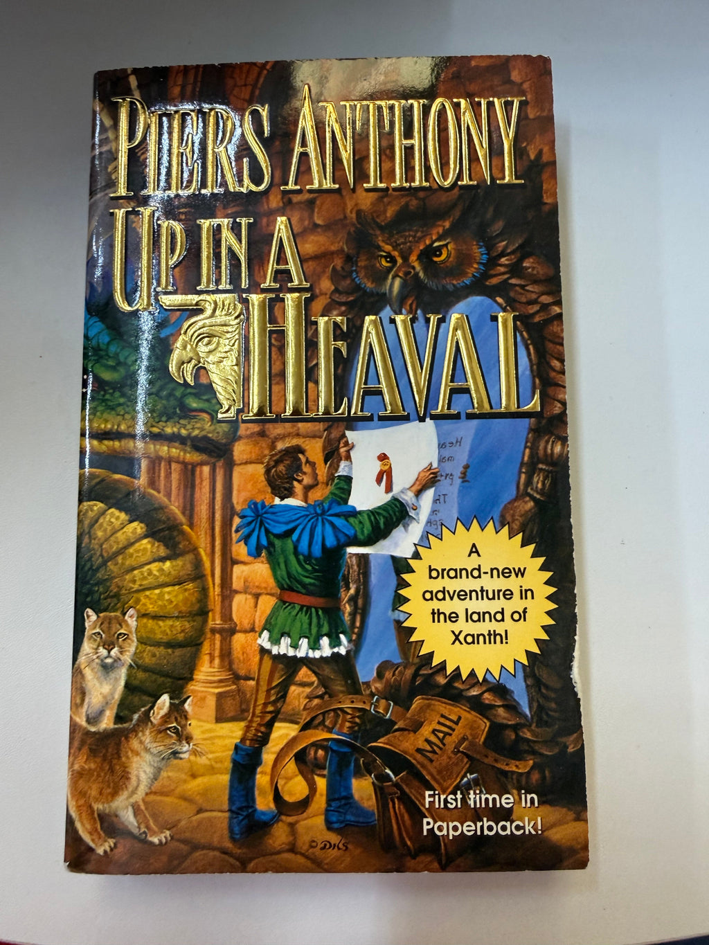 Front cover of actual used Up in a Heaval paperback