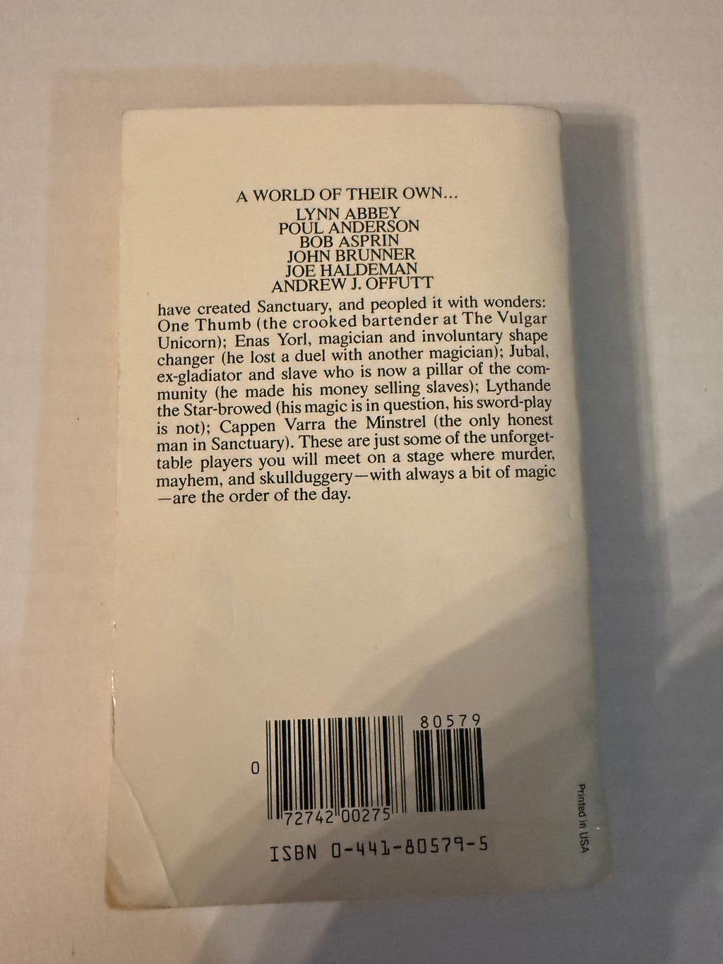 Actual back photograph of Thieves' World