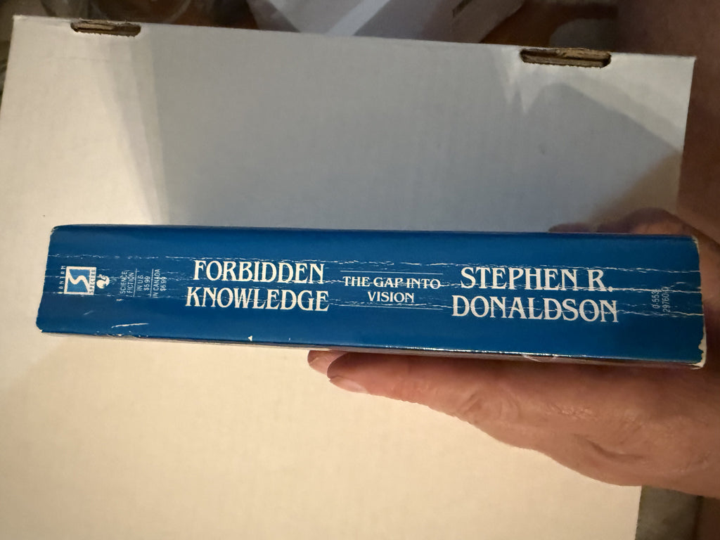 Actual spine photo of Forbidden Knowledge