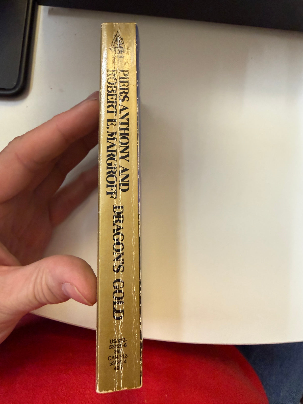 Actual spine photograph of Dragon's Gold